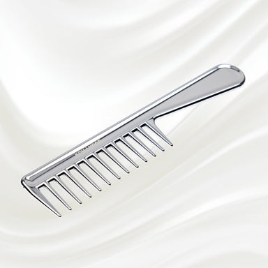 7130KK KOH-I-NOOR Metallic combwith chrome plated handle. KOH-I-NOOR's logo stamped on the comb