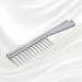 7130KK KOH-I-NOOR Metallic combwith chrome plated handle. KOH-I-NOOR's logo stamped on the comb