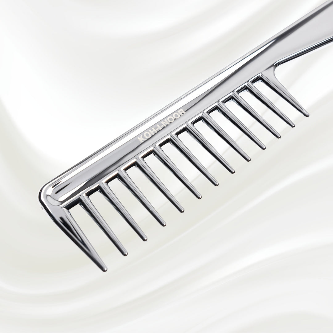 7130KK KOH-I-NOOR Metallic combwith chrome plated handle. KOH-I-NOOR's logo stamped on the comb