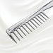 7130KK KOH-I-NOOR Metallic combwith chrome plated handle. KOH-I-NOOR's logo stamped on the comb