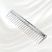 7132KK KOH-I-NOOR Metallic styling comb with chrome plated handle; KOH-I-NOOR's logo stamped on the comb