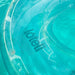 Close up photo of loteli logo and double valve on clear ring pool float