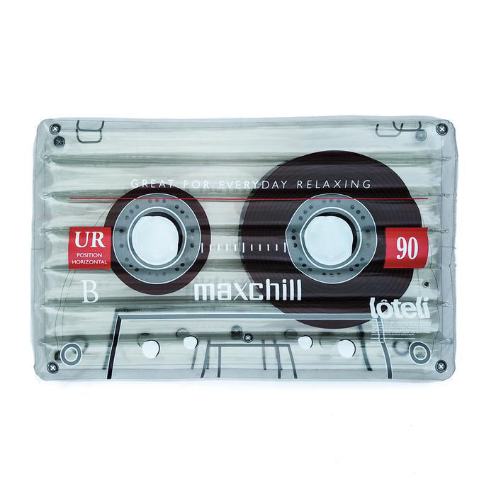 Detailed photo of the clear cassette tape float in front of a white background. The float has the words "Great for everyday relaxing" and the mimicked logo of "Maxchill."