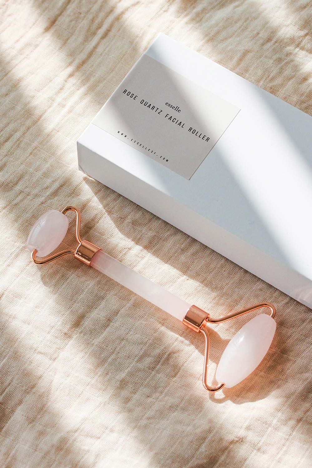 Rose Quartz Facial Roller in Rose Gold by Esselle SF