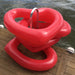 the best pool float brand has heart-shaped pool floats that make for a picture perfect image