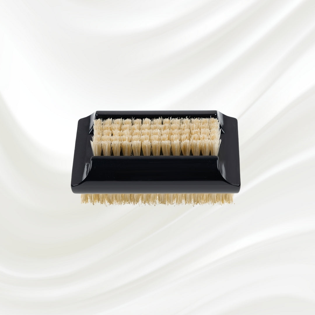 double side black nail brush with natural bristles. KOH-I-NOOR logo printed on the handle