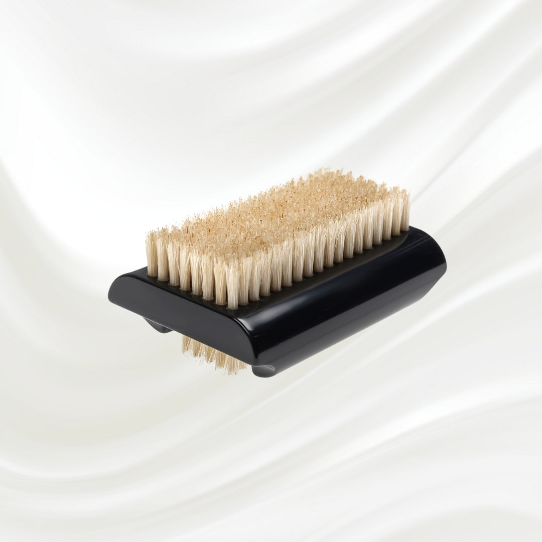 double side black nail brush with natural bristles. KOH-I-NOOR logo printed on the handle