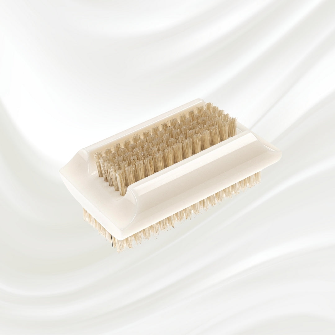 double side white nail brush with natural bristles. KOH-I-NOOR logo printed on the handle
