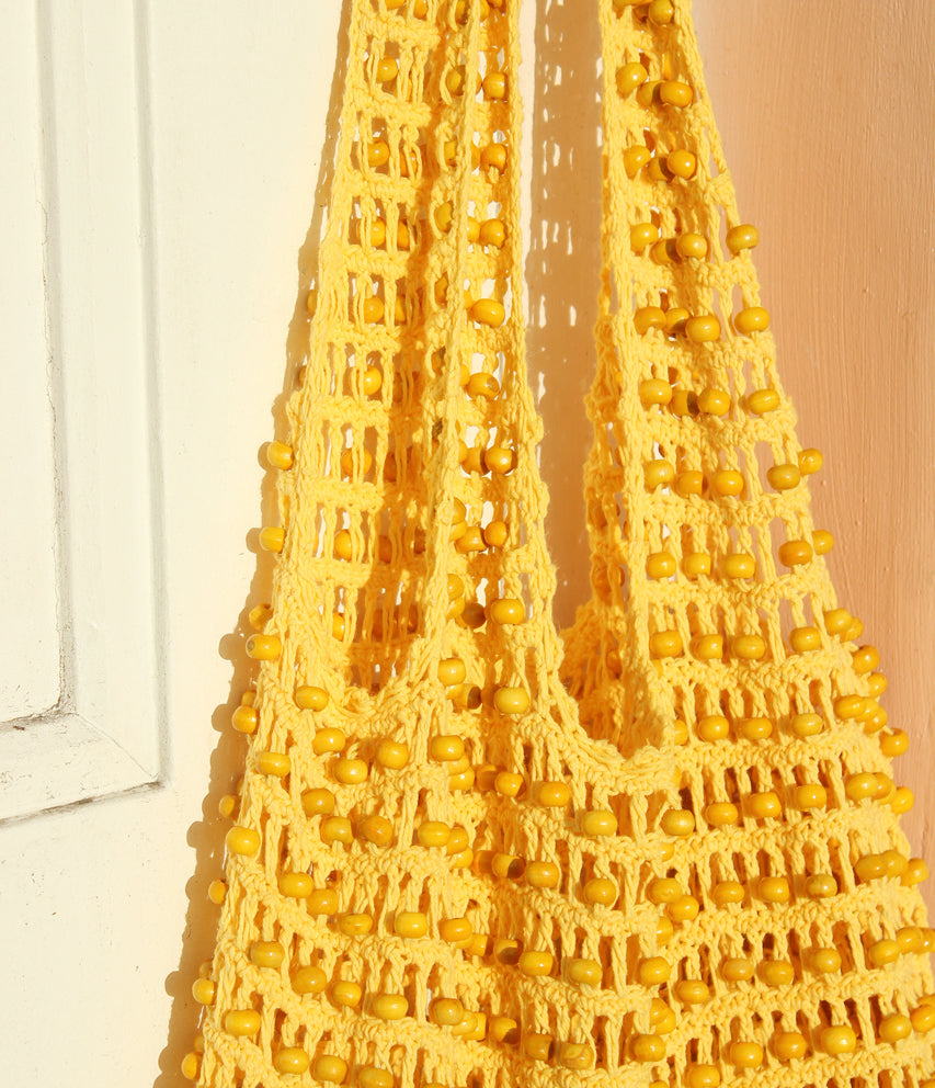 Karma Wooden Beads Crochet Bag in Pale Yellow by BrunnaCo BrunnaCo Perfumarie