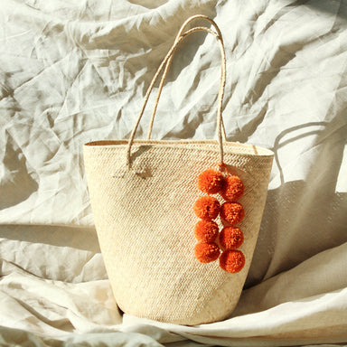  Borneo Serena Straw Tote Bag with Pumpkin Orange Pom-poms by BrunnaCo BrunnaCo Perfumarie