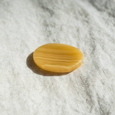  Yellow Calcite Worry Stone by Tiny Rituals Tiny Rituals Perfumarie